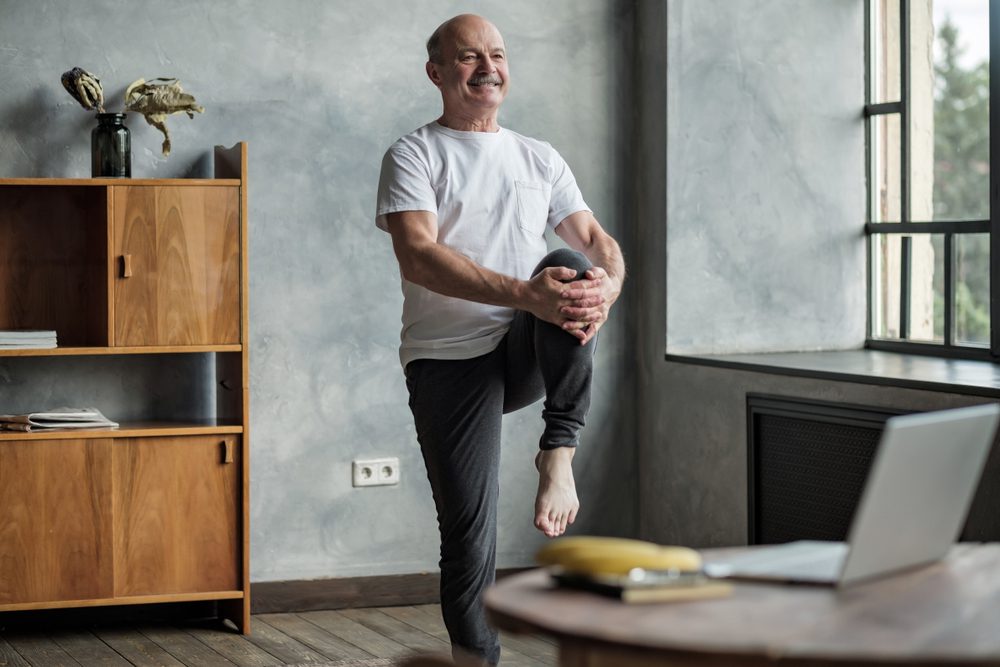 Senior,Hispanic,Man,Standing,In,One,Leg,Yoga,Balance.,Healthy